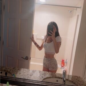 White Crop Top and Camouflage Shorts